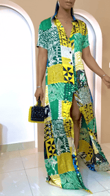 Sophisticated unlined kaftan dress made from traditional silk African Ankara fabric in vibrant multi-color patterns. Perfect for weddings, dinner parties, and formal events. Model height: 5'9".