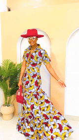 Model wearing Anaobi Kaftan Maxi Dress in bold Ankara print