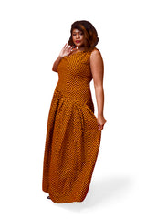 Model wearing Iriji sleeveless Ankara maxi dress handcrafted in Africa