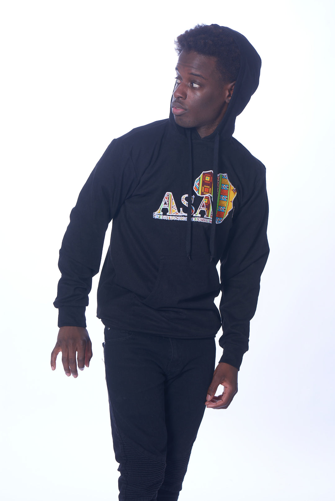 Photo of a man wearing myObioma's black college sweater, which features a hood and front pockets. It also includes a multicolor design in the center.