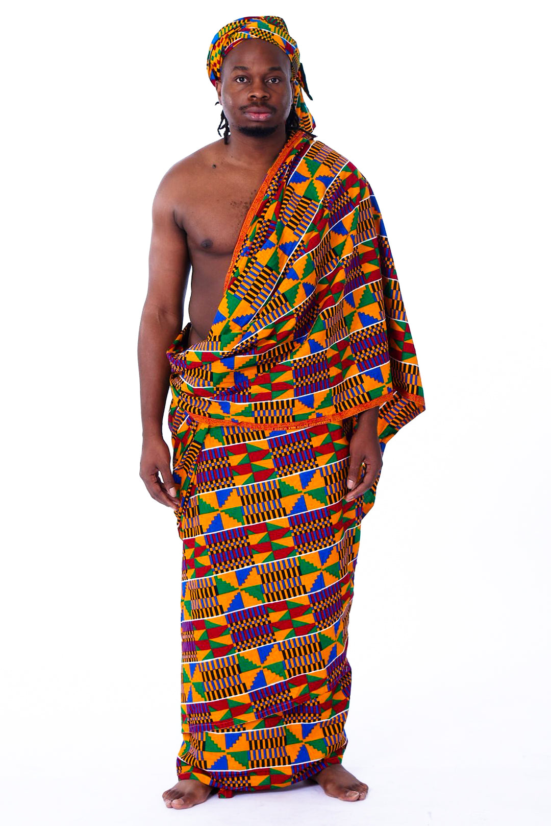 Photo of a man wearing myObioma's Kente Robe, which is long and multicolored. This luxurious kente robe is made with high-quality material and delicately created for a wide range of styles, including the model who wears the robe down the waist and draped above one shoulder.