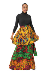 Model wearing colorful triple-layered Ankara maxi skirt with vibrant multicolor prints