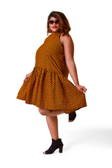 Model wearing Tuffia Ankara halter fit and flare dress handcrafted in Africa