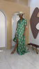 Sophisticated unlined kaftan dress made from traditional silk African Ankara fabric in vibrant multi-color patterns. Perfect for weddings, dinner parties, and formal events. Model height: 5'9".